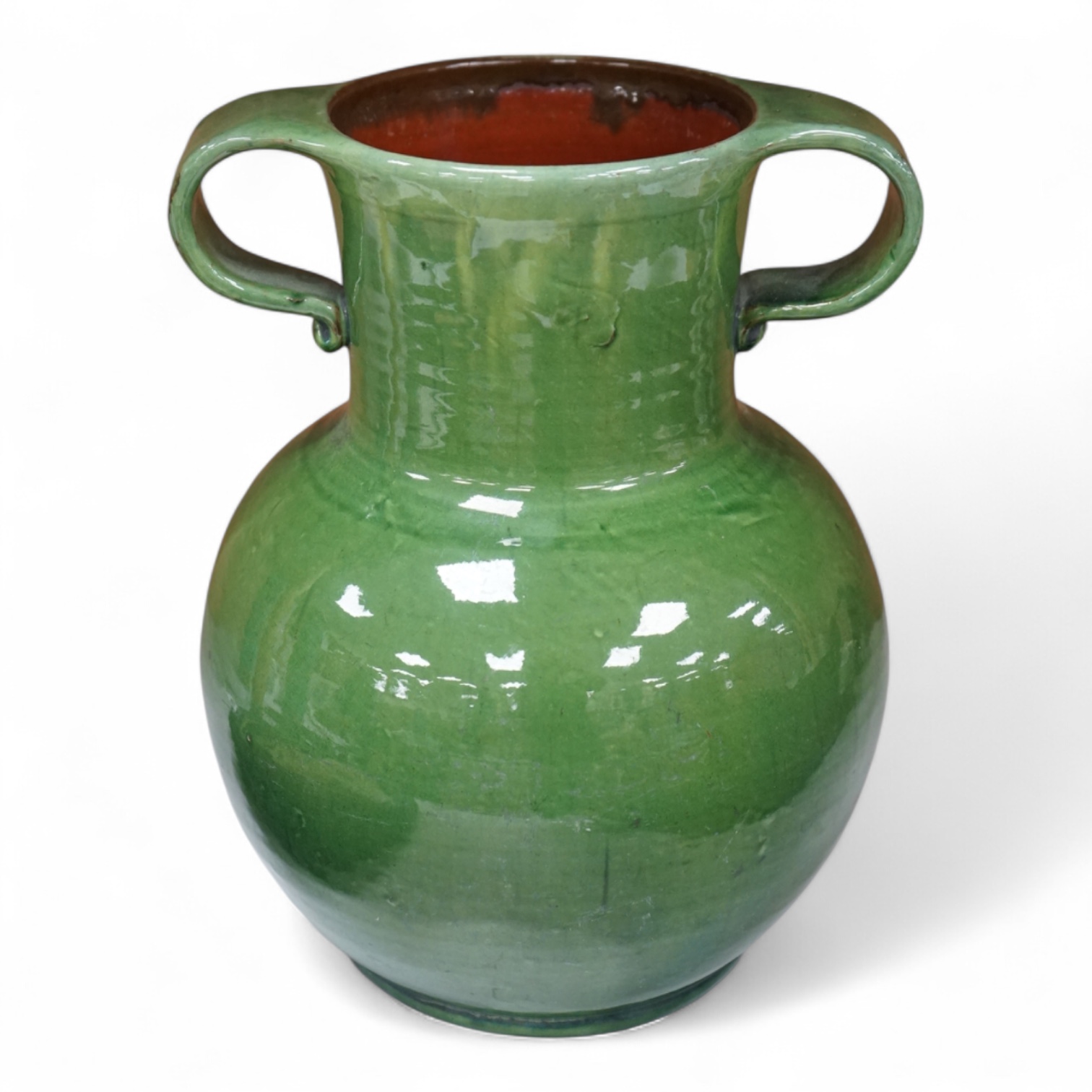 A Brannam green glazed twin handled vase, 29cm high